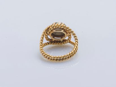 null Ring in 18K yellow gold (750 ‰) twisted set with a micro mosaic featuring a...