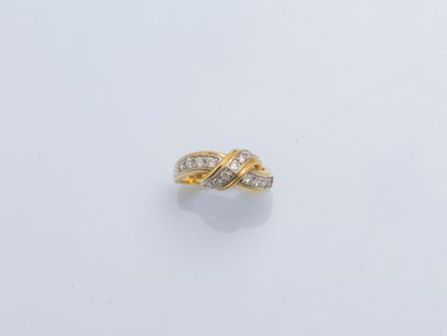 null 18K yellow gold (750 ‰) bow ring set with brilliant-cut diamonds. French work....