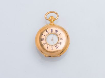 null Collar watch in 18K yellow gold (750 ‰), the case back set with a large garnet...