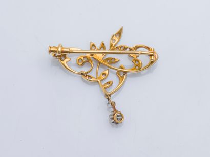 null Yellow gold and 18-karat (750 ‰) white gold scroll brooch set with rose-cut...