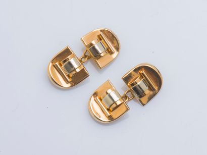 null Pair of 18K gold (750 ‰) cufflinks in three colors with geometric decoration....