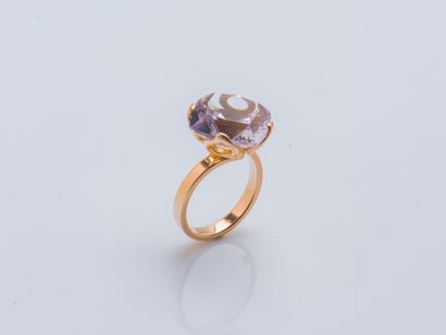 SUPERORO 18K (750 ‰) rose gold ring set with a cushion-cut rose quartz, the openwork...