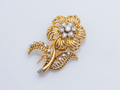 MAUBOUSSIN 18K yellow gold (750 ‰) flower lapel clip brooch formed of smooth and...