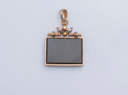 null Rectangular-shaped pendant in 9-karat yellow gold (375 ‰) and silver (800 ‰)...