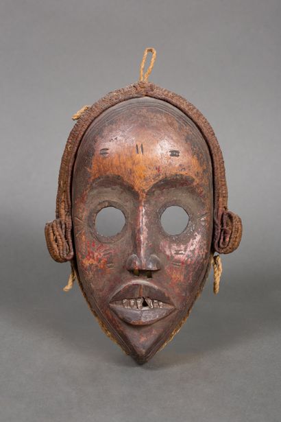 Dan mask, Ivory Coast
Wood with brown patina,...