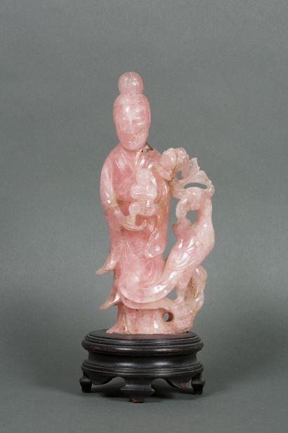 China
Carved rose quartz group with a woman...