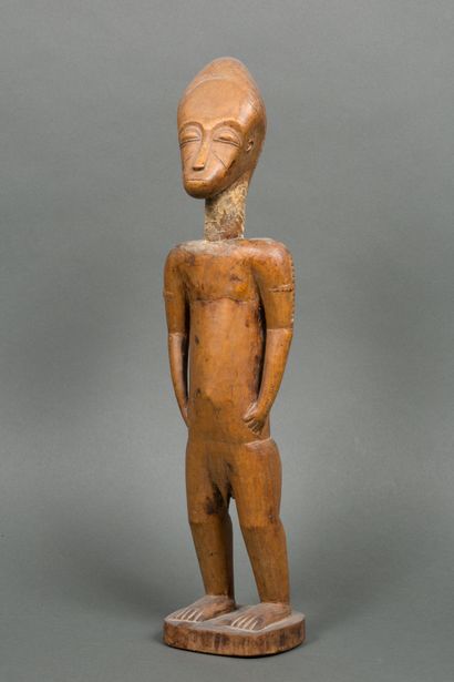 Baoule male statue, Ivory Coast
Wood with...