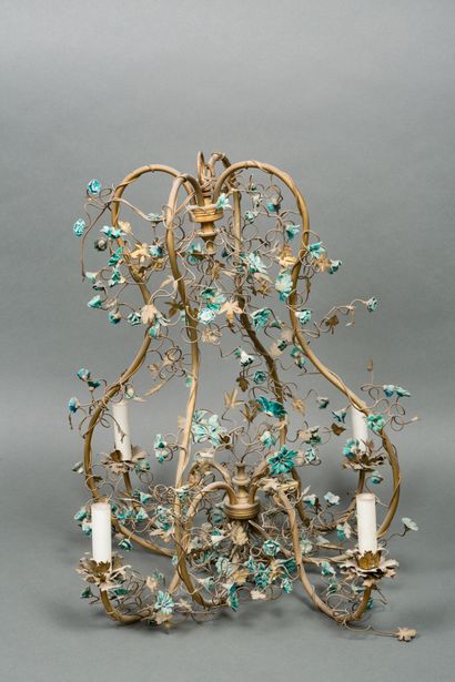 A gilded metal cage chandelier decorated...