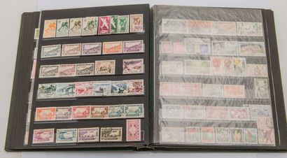 null Lot of two albums including stamps of the former colonies before and after independence...
