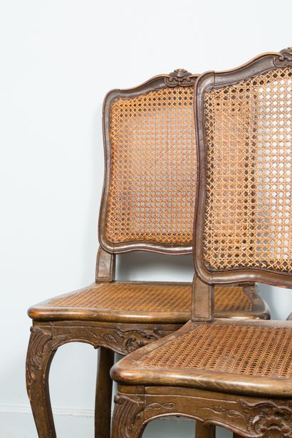 null Lot including: two chairs with cane bottom in molded and carved wood, joined...