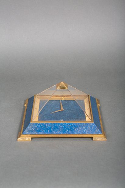 null JAEGER LECOULTRE, About 1970
Table clock forming a pyramid in gilded brass,...