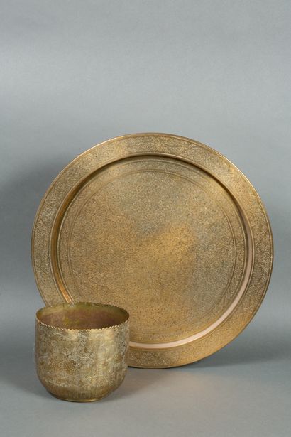 Cover pot and its tray in chased brass decorated...
