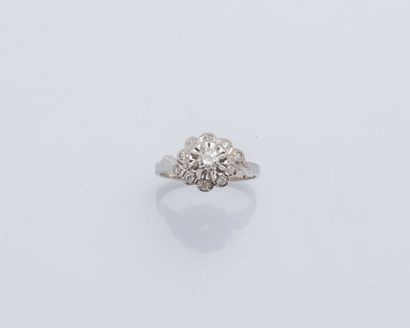 null Bague fleur en or gris 18 carats (750 ‰) sertie d’un diamant rond de 0,2 carat...