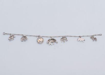 Attribué à JANESICH Bracelet chaînette Charm’s en platine (950 ‰) et or gris 14 carats...