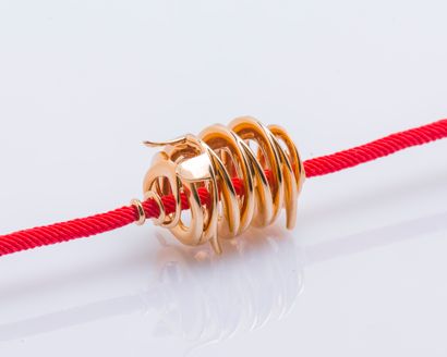 TTF Bracelet formed by a pendant drawing a pig in 18K (750 ‰) rose gold threads twisted...