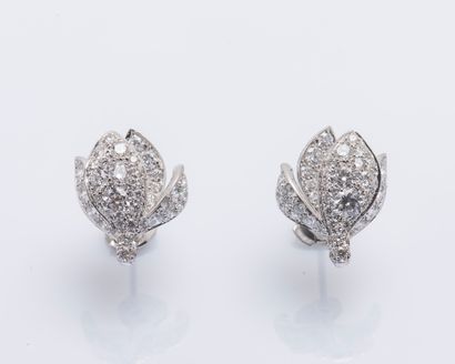 TTF Pair of 18K (750 ‰) white gold Magnolia earrings set with one hundred brilliant-cut...