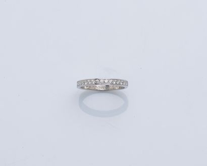 CARTIER Platinum (950 ‰) half wedding band set with brilliant-cut diamonds. Signed,...