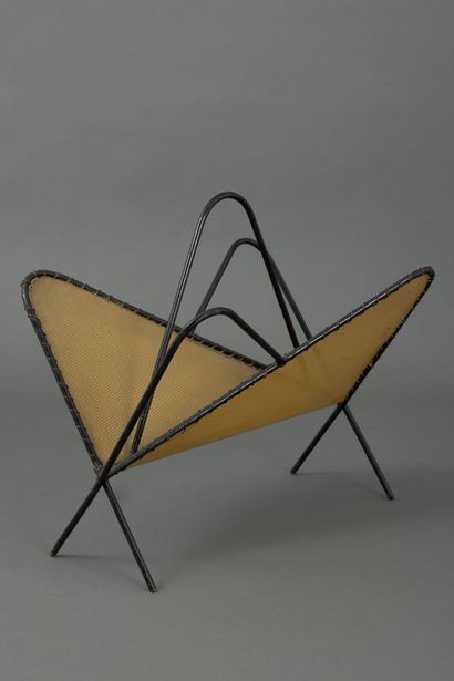 null In the style of Mathieu MATÉGOT (1910-2001) 
Yellow and black lacquered perforated...