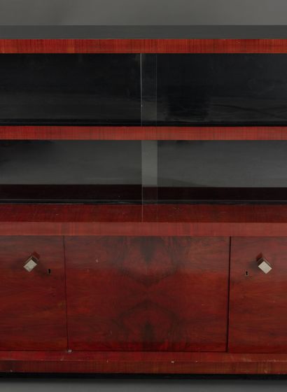 null Red mahogany veneered sideboard opening on the lower part with three leaves...