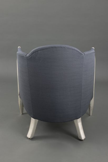 null Silver-lacquered wood armchair on tapered legs, saber-shaped back legs. Grey...