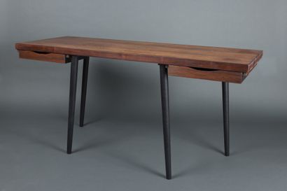null Flat desk in rosewood veneer, opening with two small drawers in the waist and...