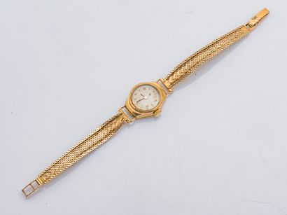 Cadran LIP Bracelet montre de dame en or jaune 18 carats (750 millièmes), le boitier...