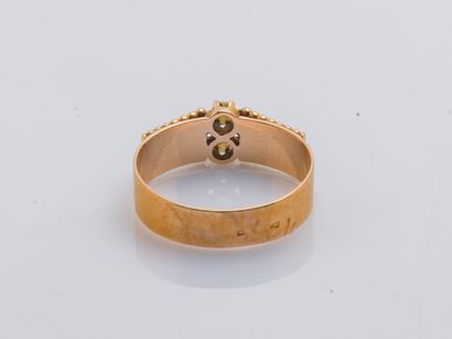 null Ring band in pink gold 18 carats (750 thousandths) set with seed pearls. French...