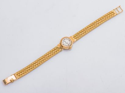 BREITLING Bracelet montre de dame en or jaune 18 carats (750 ‰), le boitier rond...