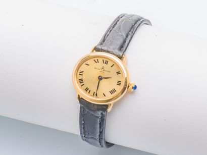 BAUME & MERCIER 18K yellow gold (750 ‰) ladies' wristwatch, the oval-shaped case,...