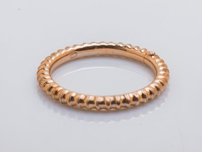 null Bracelet rush opening child in pink gold 9 carats (375 thousandths) chased with...