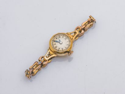 null Bracelet montre de dame, le boitier en or jaune 18 carats (750 millièmes) à...