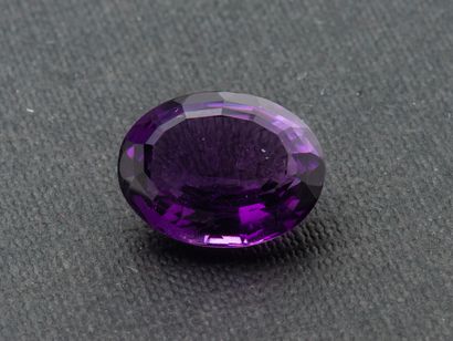 null A calibrated oval amethyst of approximately 11.6 carats.