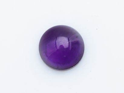 null A round cabochon of amethyst of approximately 9.98 carats.