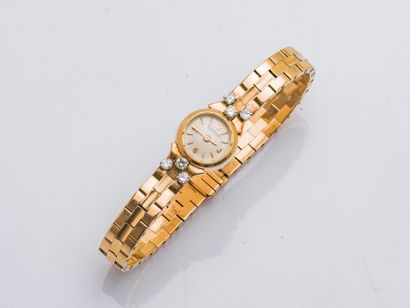 JAEGER-LeCOULTRE Ladies' watch bracelet in 18K yellow gold (750 ‰), the round case...