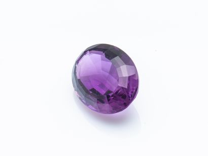 null A calibrated oval amethyst of approximately 11.6 carats.