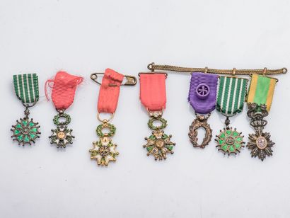 null Set of seven decorations in reduction including: two crosses of Knight of Arts...