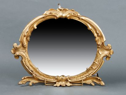 Miroir rocaille en bronze doré. XIXème siècle....