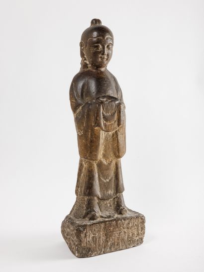 null Chine, XIIe-XIVe siècle
Sujet en grès sculpté représentant un porteur d’offrandes.
H.:...