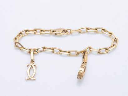 CARTIER Bracelet gourmette modèle Santos en or jaune 18 carats (750 ‰), formé d'une...