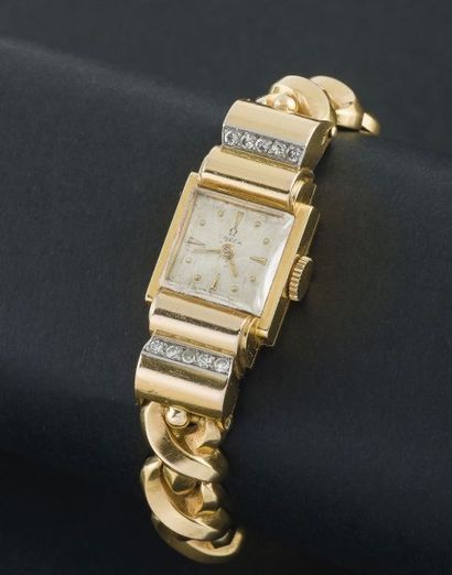 OMEGA (LINGOT LADY - OR JAUNE), vers 1950 Élégante montre de femme, le bracelet intégré...