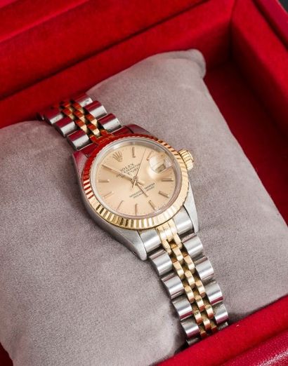 ROLEX (OYSTER PERPETUAL DATEJUST/LADY OR & ACIER RÉF.
69173), vers 1991
Modèle féminin...