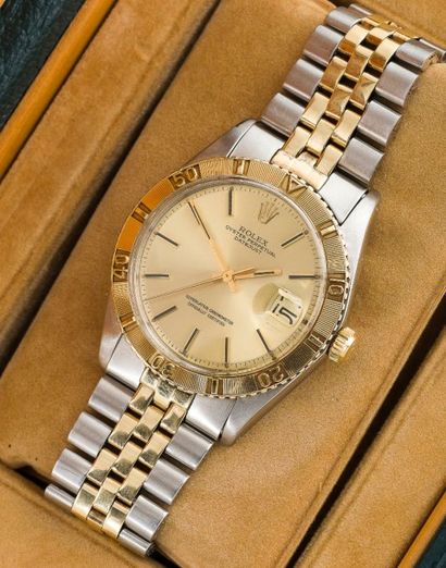 ROLEX (OYSTER PERPETUAL DATE JUST TURNOGRAPH - OR &
ACIER RÉF. 1625), vers 1974
Montre...