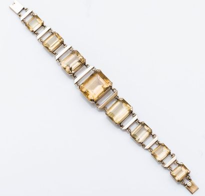 null Bracelet articulé en or jaune 18 carats (750 millièmes) serti en chute de citrines...