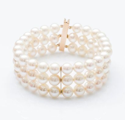null Bracelet en or rose 18 carats (750 millièmes) composé de trois rangs de perles...