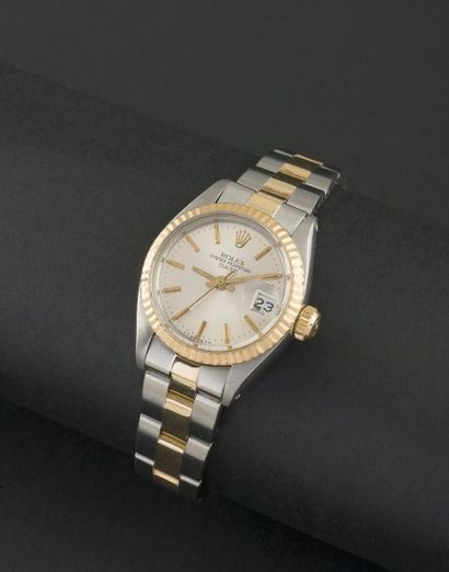 ROLEX (OYSTER LADY - PERPÉTUEL DATE / OR 14 carats & ACIER RÉF. 6917), vers 1983

Montre...