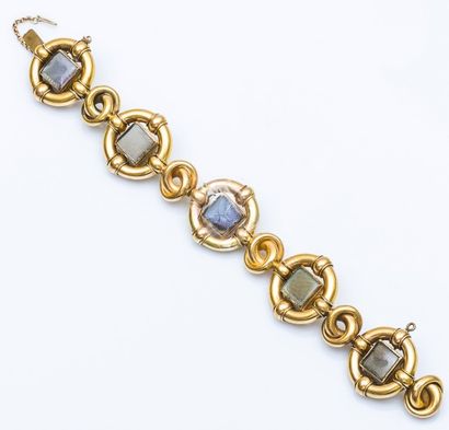 null Bracelet articulé en or jaune 18 carats (750 millièmes) formé de larges anneaux...