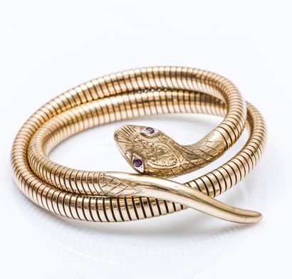 null Bracelet serpent tubogaz en or jaune 9 carats (375 millièmes), la tête ornée...