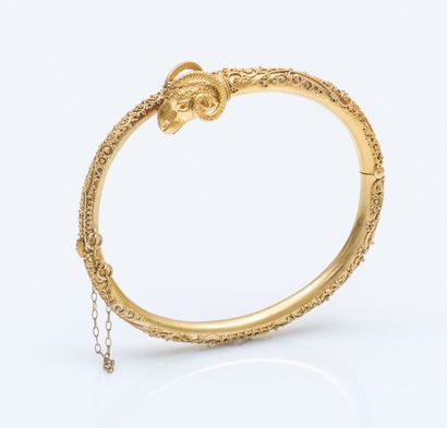 Attribué à MARCHESINI Fin XIXe siècle 

Bracelet jonc ouvrant en or jaune 18 carats...