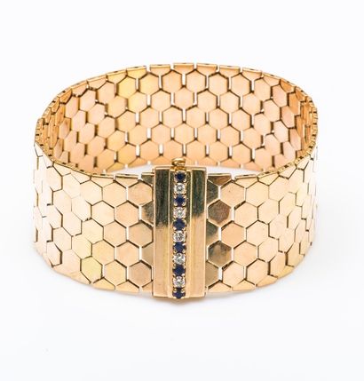 MELLERIO Paris 

Bracelet ruban plat en or jaune 18 carats (750 millièmes) à maillons...
