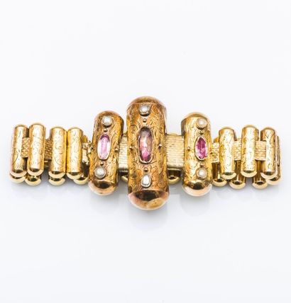 null Bracelet en or jaune 14 carats (585 millièmes), les maillons cylindriques gravés...